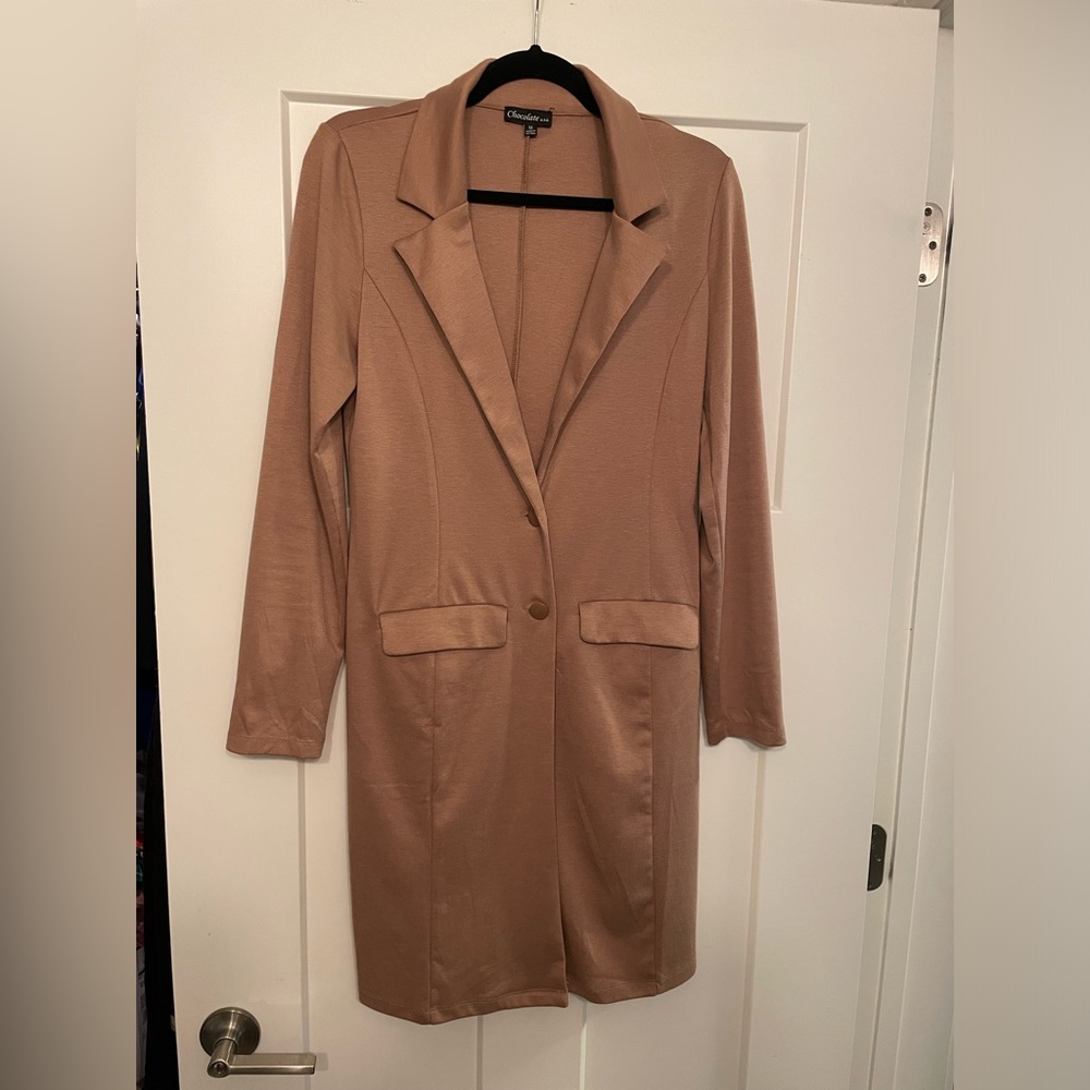 Long tan coat.